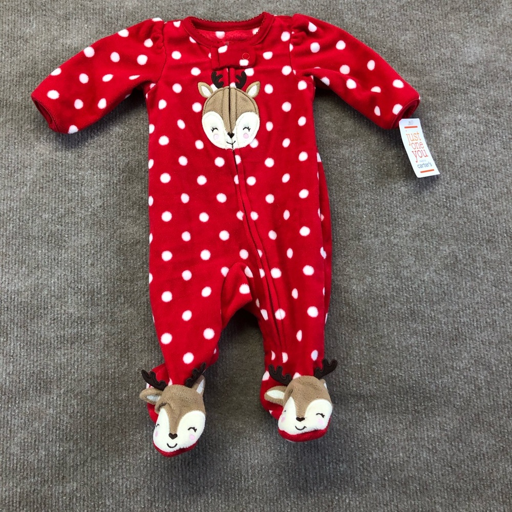 NWT Carters newborn pajamas. Red with white dots and a reindeer on the front